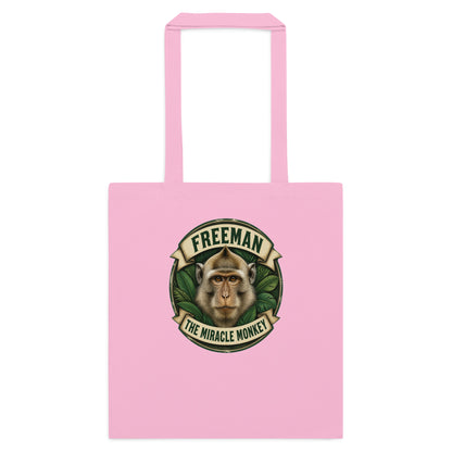 Mulepose med Freeman The Miracle Monkey badge med en abe i grønt i farven lyserød, set forfra