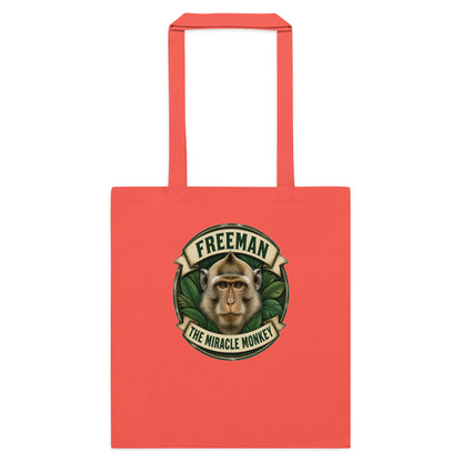 Mulepose med Freeman The Miracle Monkey badge med en abe i grønt i farven koral, set forfra