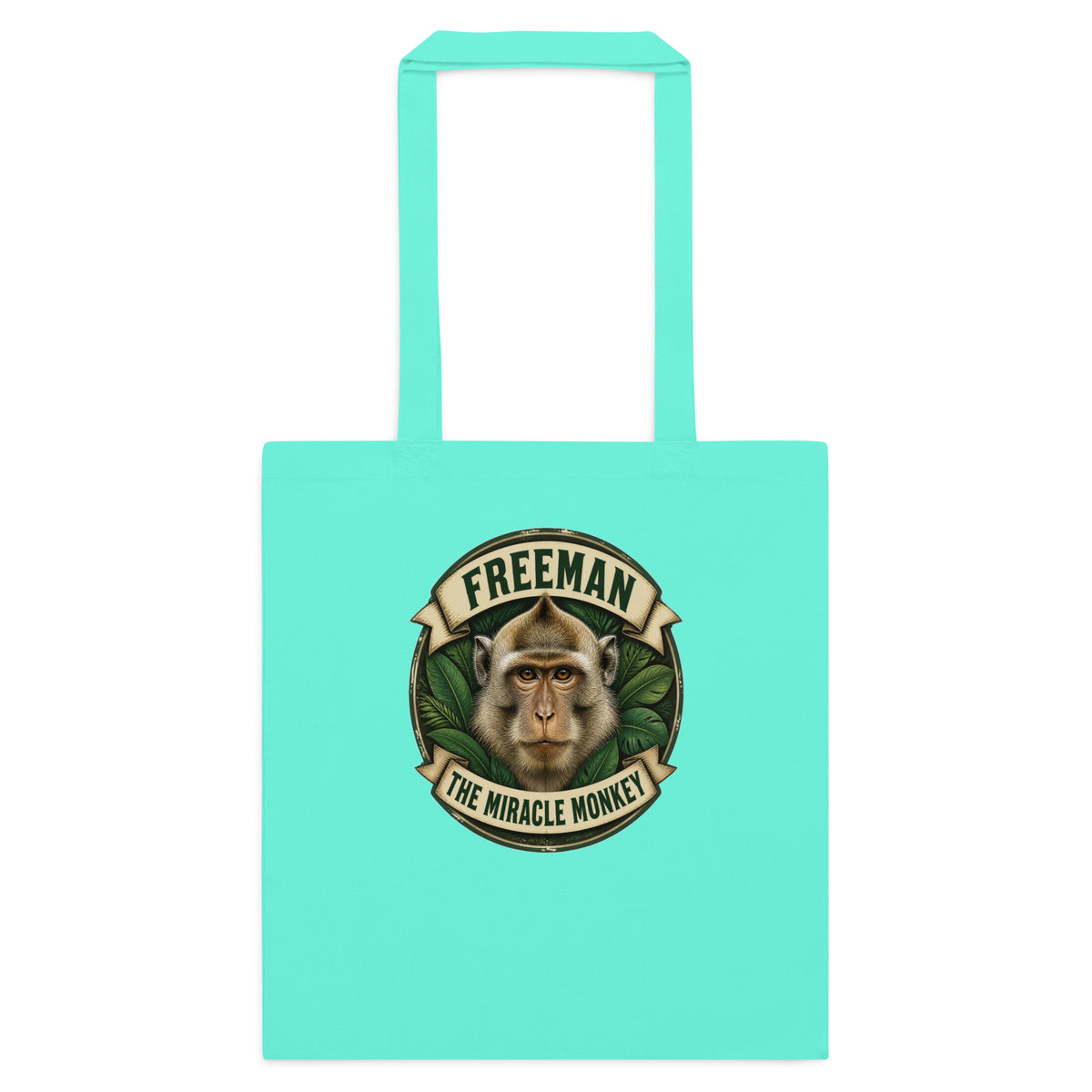 Mulepose med Freeman The Miracle Monkey badge med en abe i grønt i farven mintgrøn, set forfra
