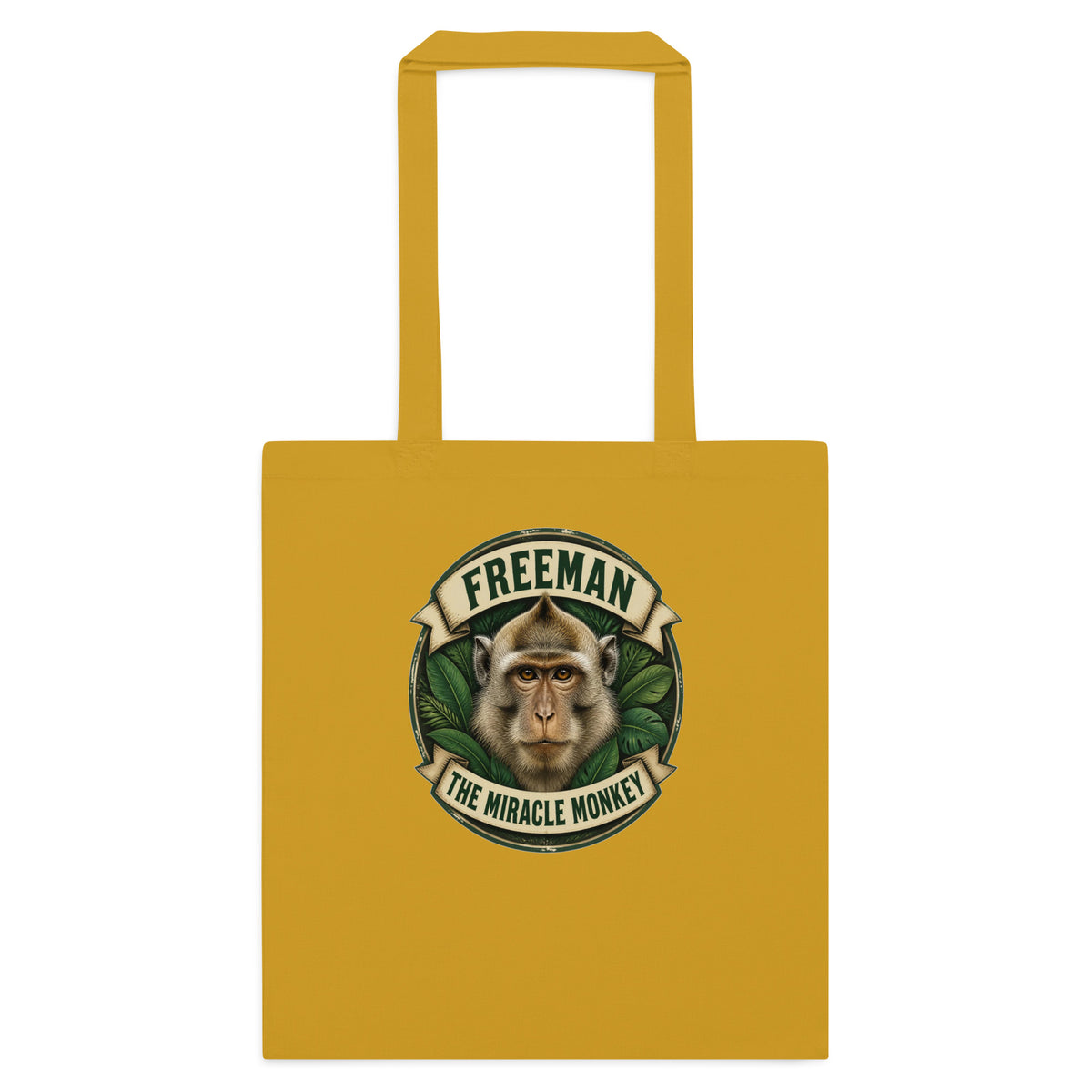 Mulepose med Freeman The Miracle Monkey badge med en abe i grønt i farven sennepsgul, set forfra