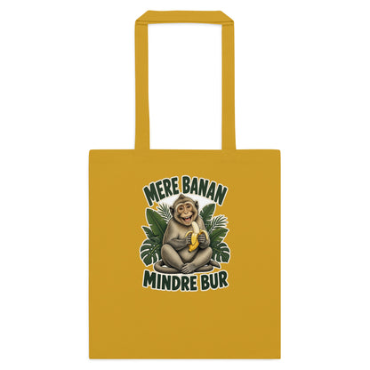 Mulepose med teksten Mere banan, mindre bur og en glad abe med en banan i farven sennepsgul, set forfra