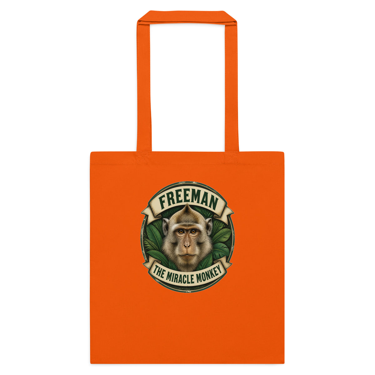 Mulepose med Freeman The Miracle Monkey badge med en abe i grønt i farven orange, set forfra