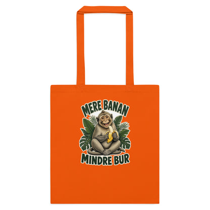 Mulepose med teksten Mere banan, mindre bur og en glad abe med en banan i farven orange, set forfra