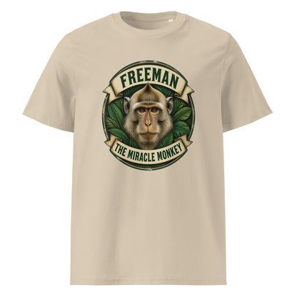Freeman The Miracle Monkey t-shirt med abe i grønt badge i farven sand, set forfra