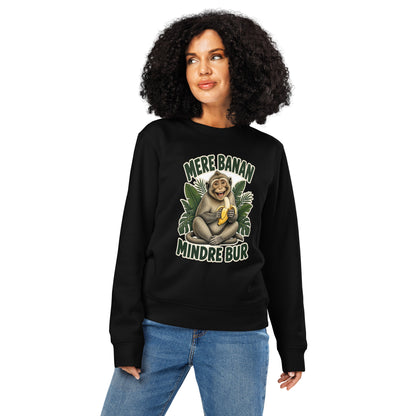 Sweatshirt med teksten Mere banan, mindre bur og en glad abe med en banan i farven sort, båret af en ung kvinde