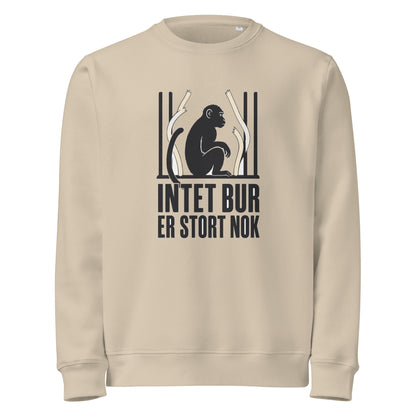 Sweatshirt med teksten Intet bur er stort nok og en abe bag tremmer i farven sand, set forfra