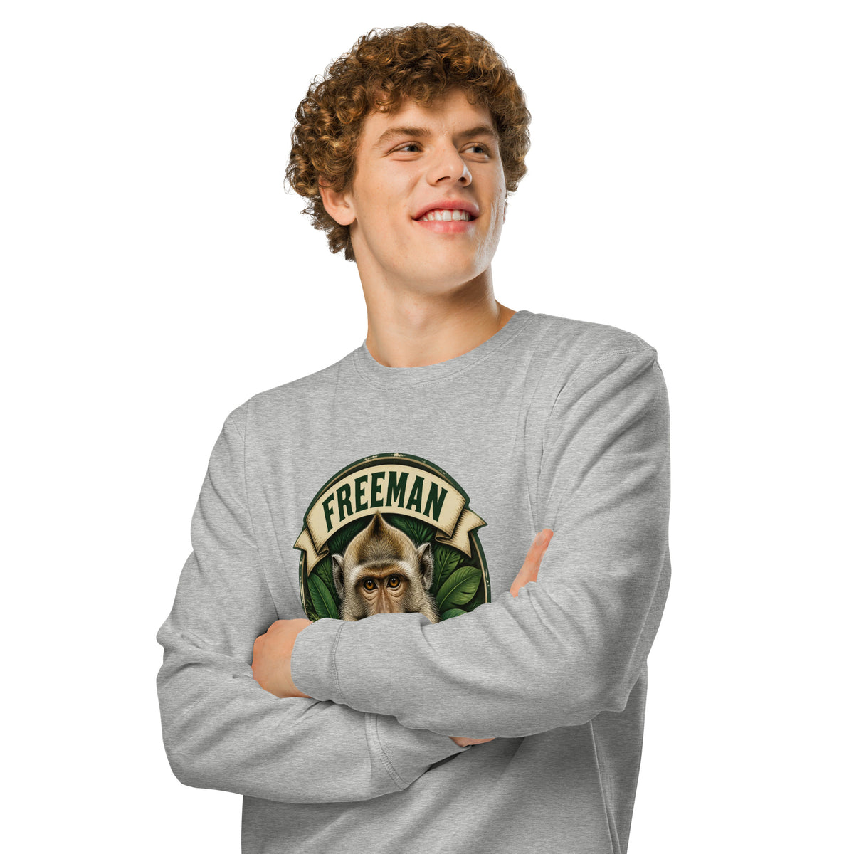 Sweatshirt med Freeman The Miracle Monkey badge med en abe i grønt i farven lysegrå meleret, båret af en ung mand