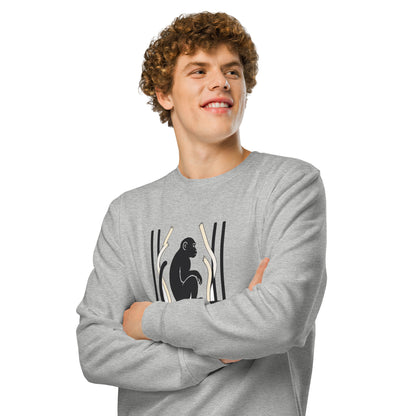 Sweatshirt med teksten Intet bur er stort nok og en abe bag tremmer i farven lysegrå meleret, båret af en ung mand